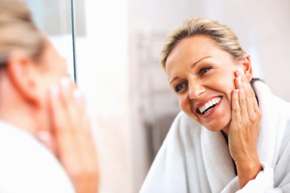 Happy healthy woman happy with the anti-aging benefits of Twist 25 DHEA cream - depression
